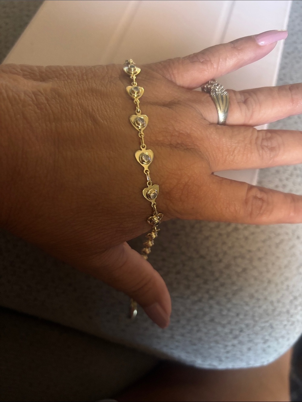 Gold Heart Link Bracelet with Crystal Accents. laminated gold.